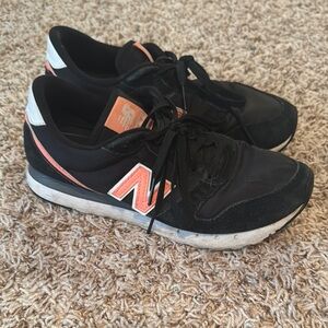 New Balance 311 Black and Pink Sneakers